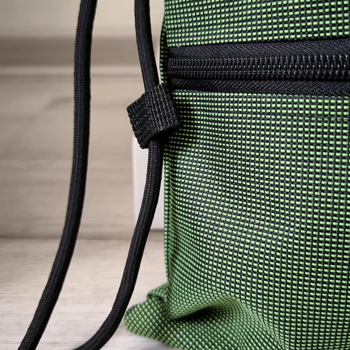 Mochila plegable de tejido Oxford con cordón