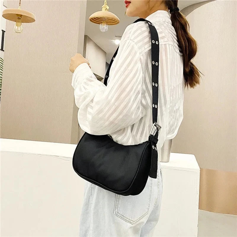 Cartera de nylon con cierre y bolsillo para celular