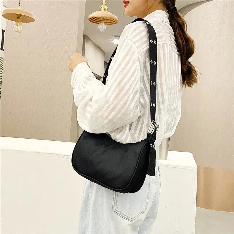 Cartera de nylon con cierre y bolsillo para celular