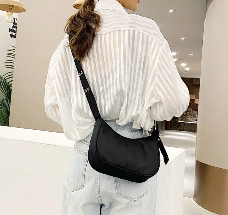 Cartera de nylon con cierre y bolsillo para celular