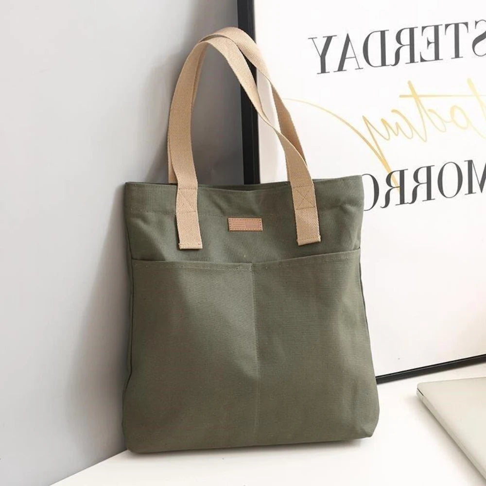Bolso tote abierto de lona con bolsillo exterior