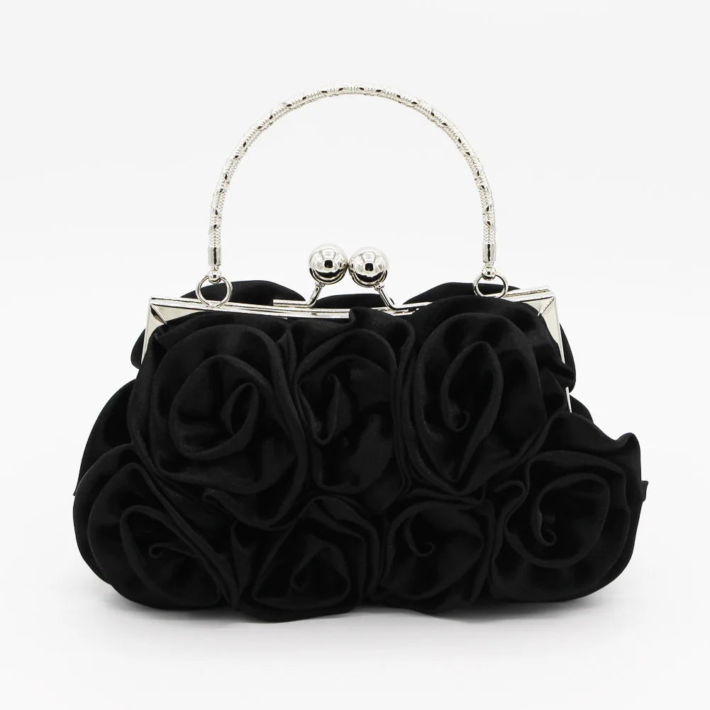 Minaudière rígida con detalle floral y cadena