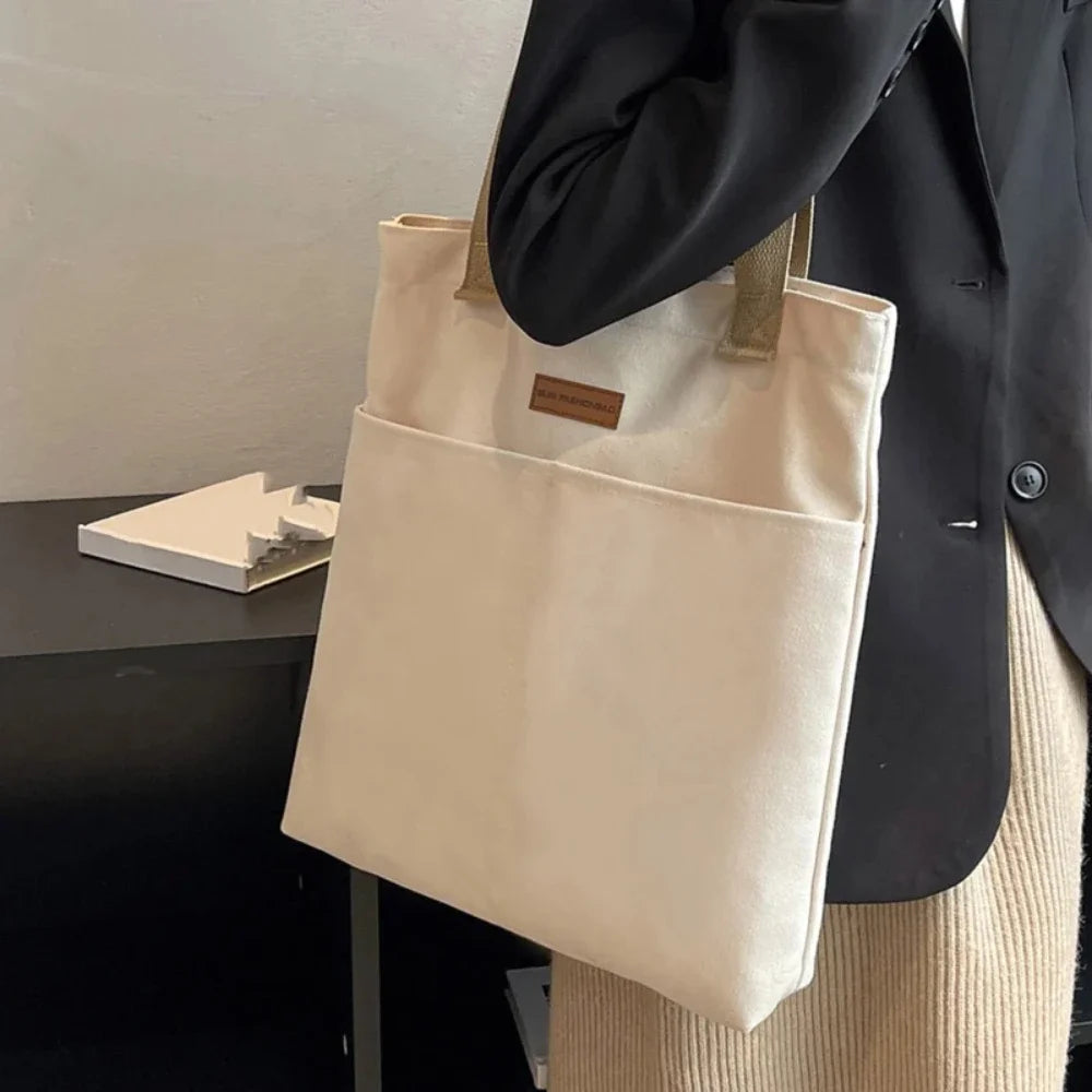 Bolso tote abierto de lona con bolsillo exterior