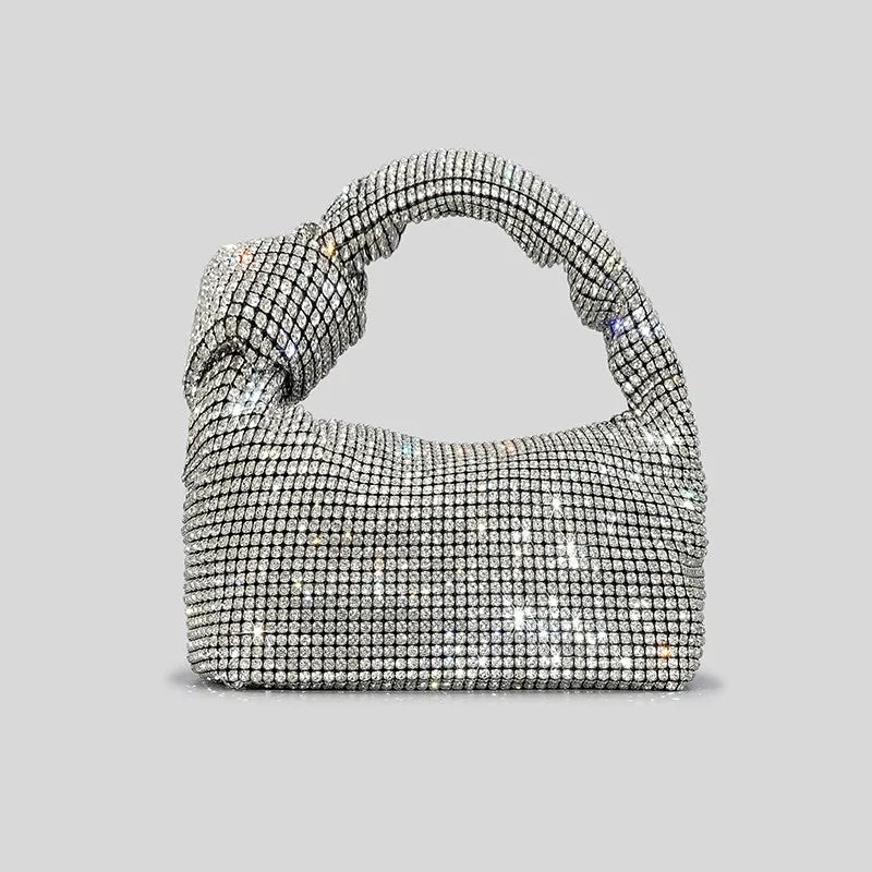 Cartera de fiesta con brillos y asa anudada