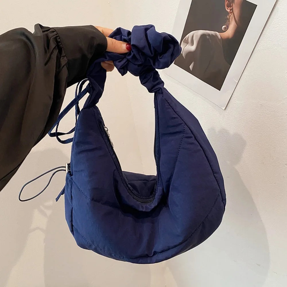 Cartera hobo fruncida con cierre superior