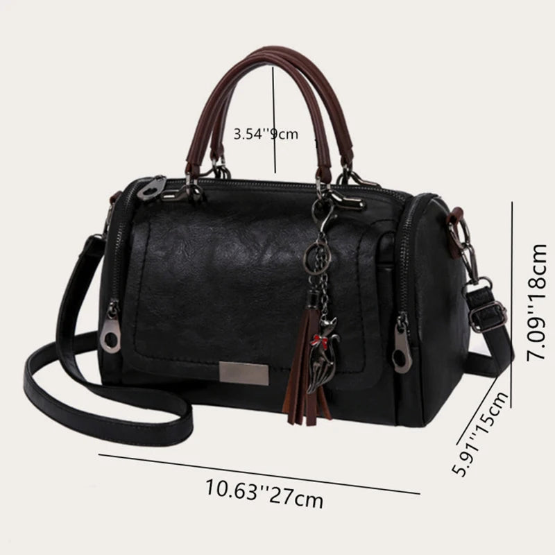 Cartera Boston con borla y correa desmontable
