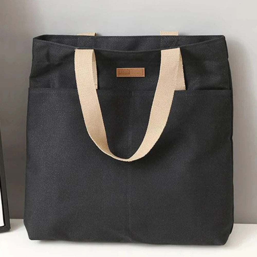 Bolso tote abierto de lona con bolsillo exterior