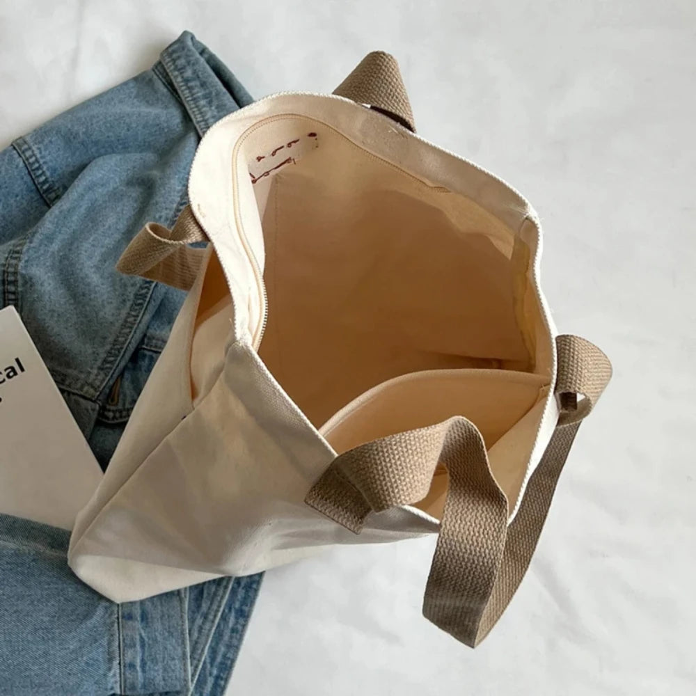 Bolso tote abierto de lona con bolsillo exterior