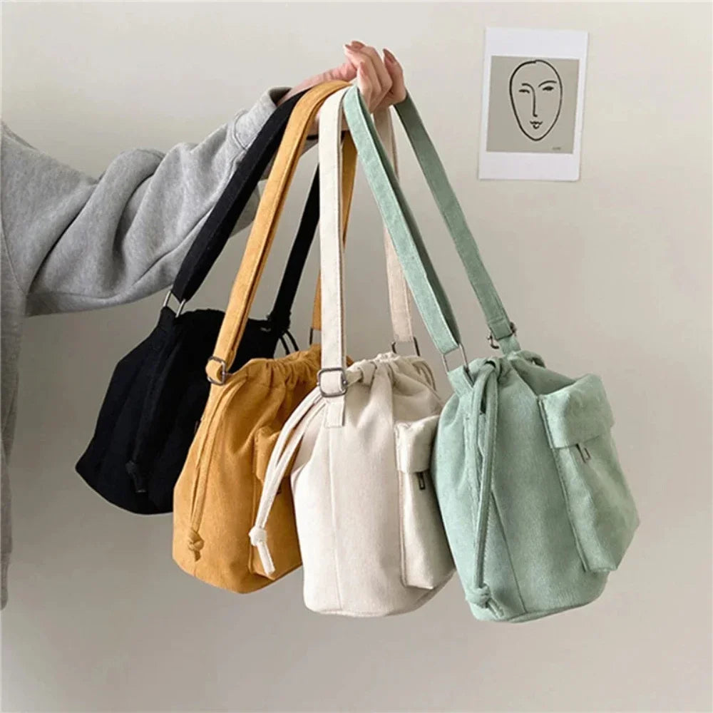 Cartera de corderoy con bolsillo interior con cierre