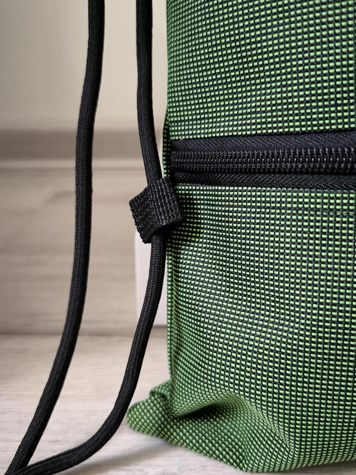 Mochila plegable de tejido Oxford con cordón