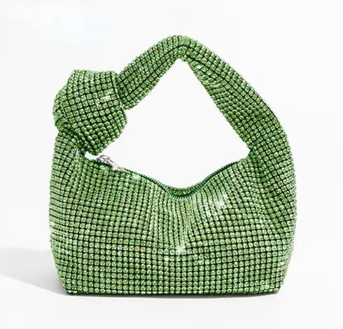 Cartera de fiesta con brillos y asa anudada