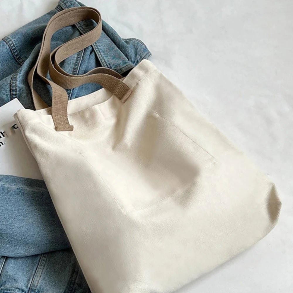 Bolso tote abierto de lona con bolsillo exterior