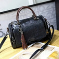Cartera Boston con borla y correa desmontable