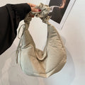 Cartera hobo fruncida con cierre superior