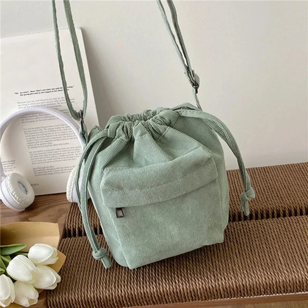 Cartera de corderoy con bolsillo interior con cierre