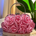 Minaudière rígida con detalle floral y cadena