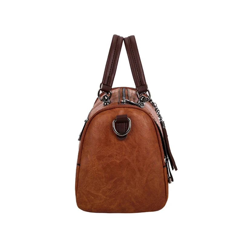 Cartera Boston con borla y correa desmontable