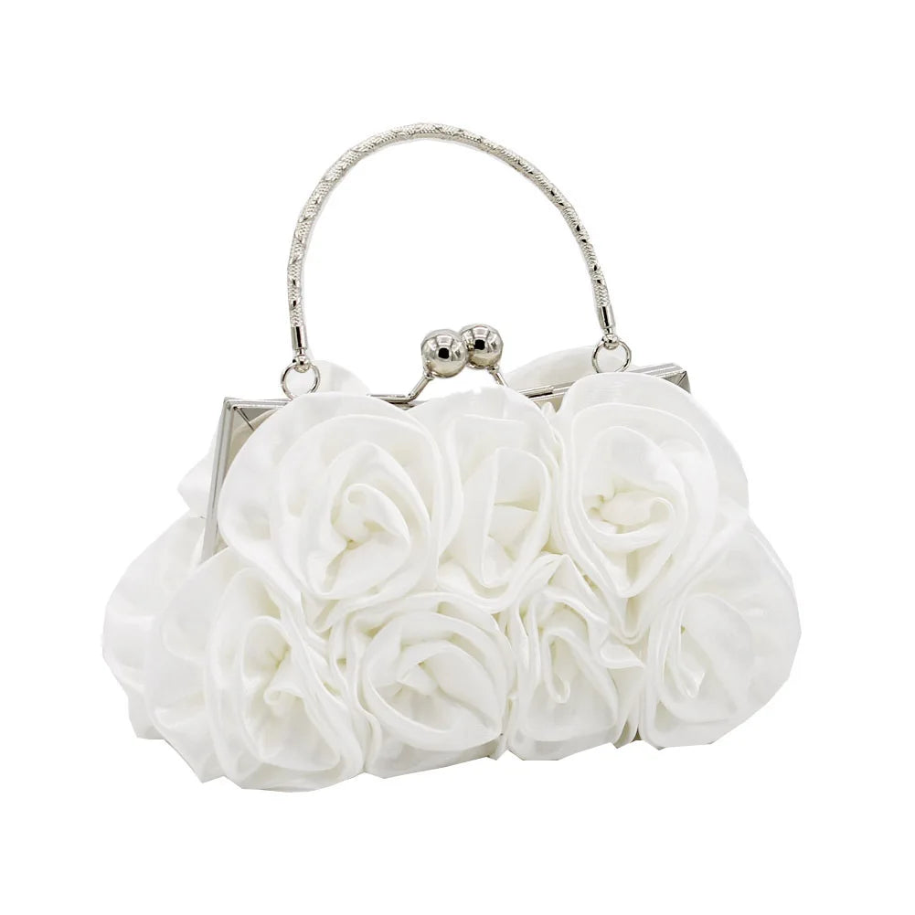Minaudière rígida con detalle floral y cadena