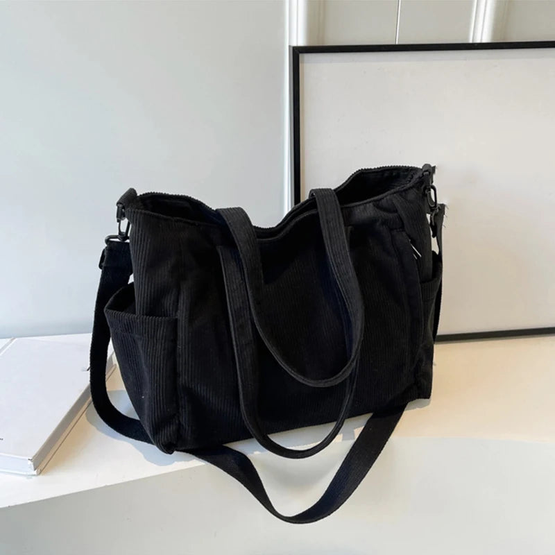 Bolso tote de corderoy con correa ajustable y cierre