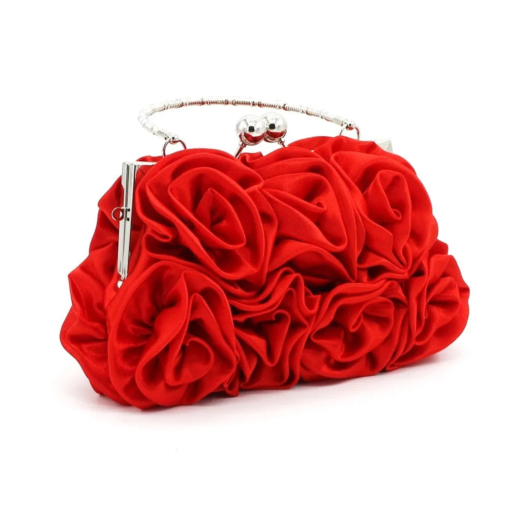 Minaudière rígida con detalle floral y cadena