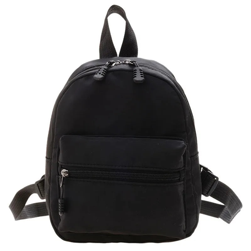 Mini mochila de nylon con bolsillo de solapa