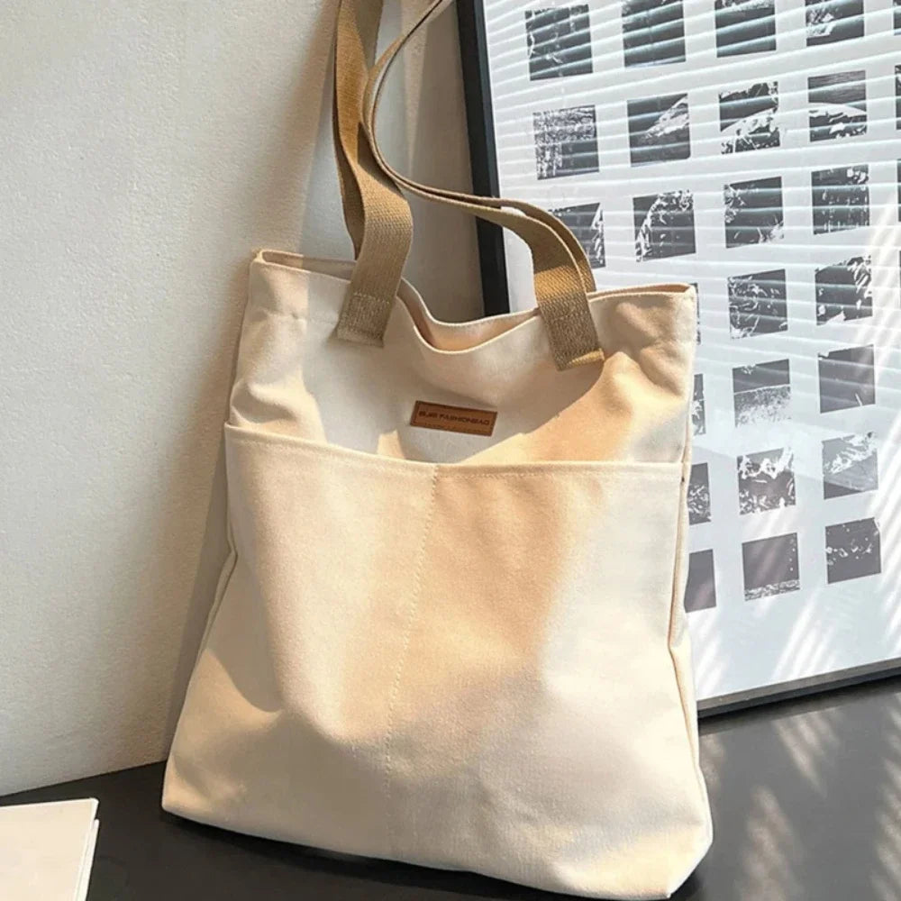 Bolso tote abierto de lona con bolsillo exterior