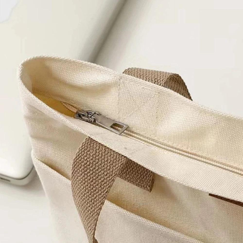 Bolso tote abierto de lona con bolsillo exterior