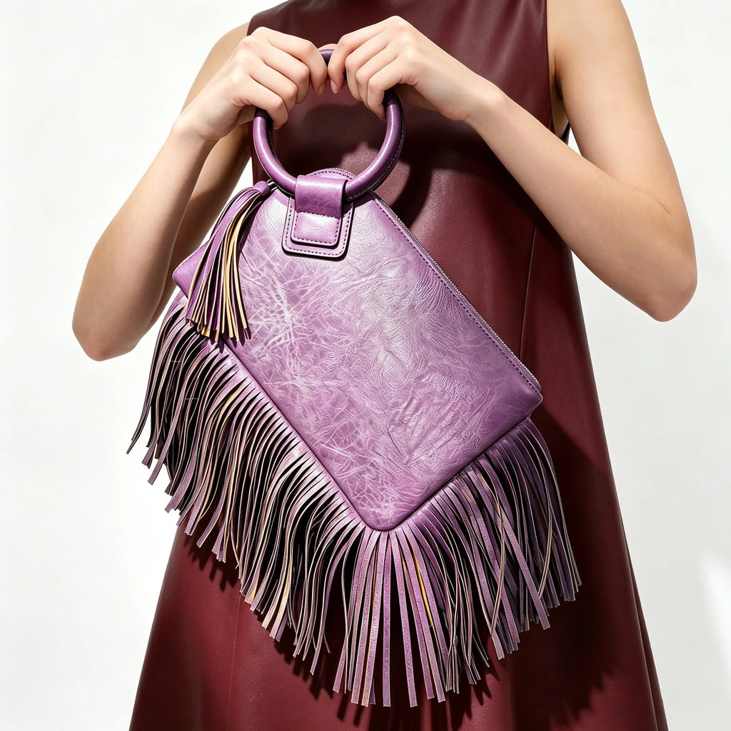 Cartera de mano suave con flecos y cierre