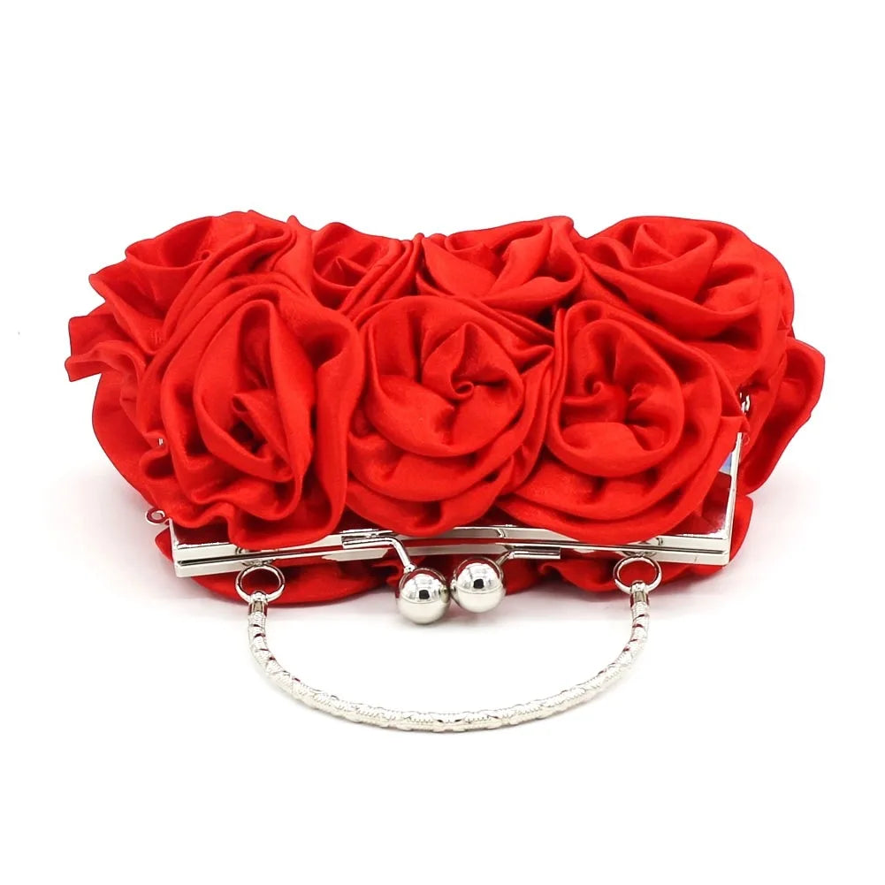 Minaudière rígida con detalle floral y cadena