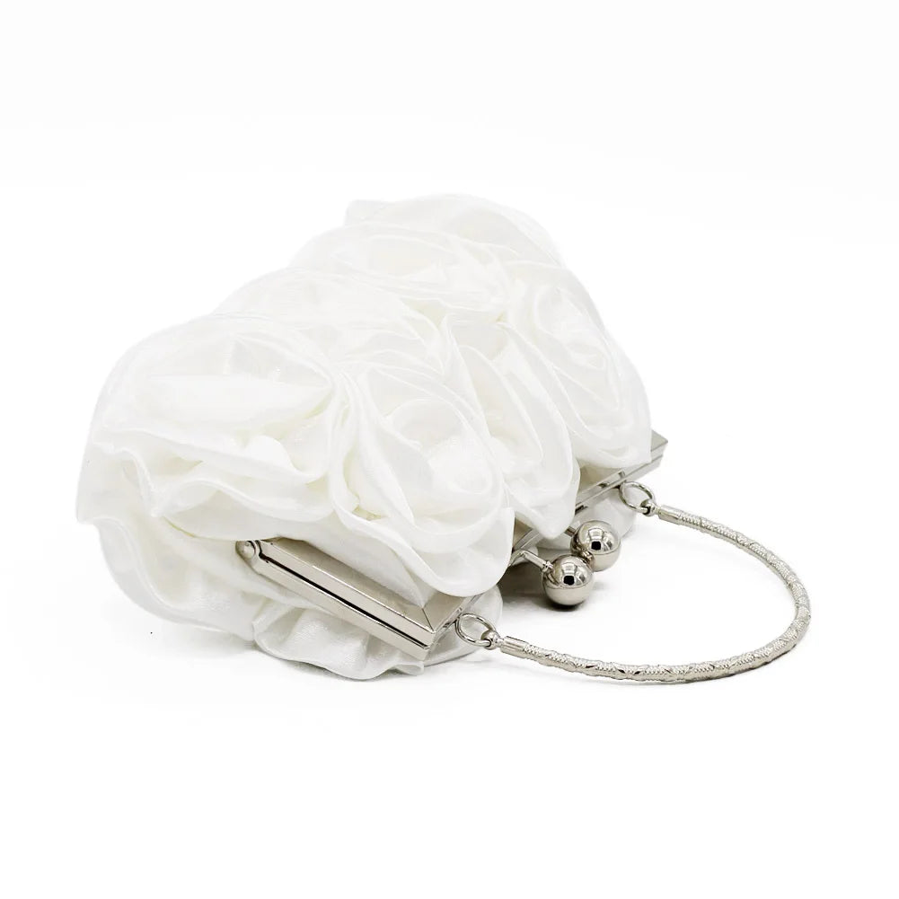 Minaudière rígida con detalle floral y cadena