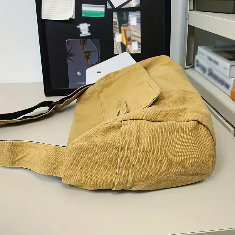 Bandolera de lona con solapa y bolsillo para celular