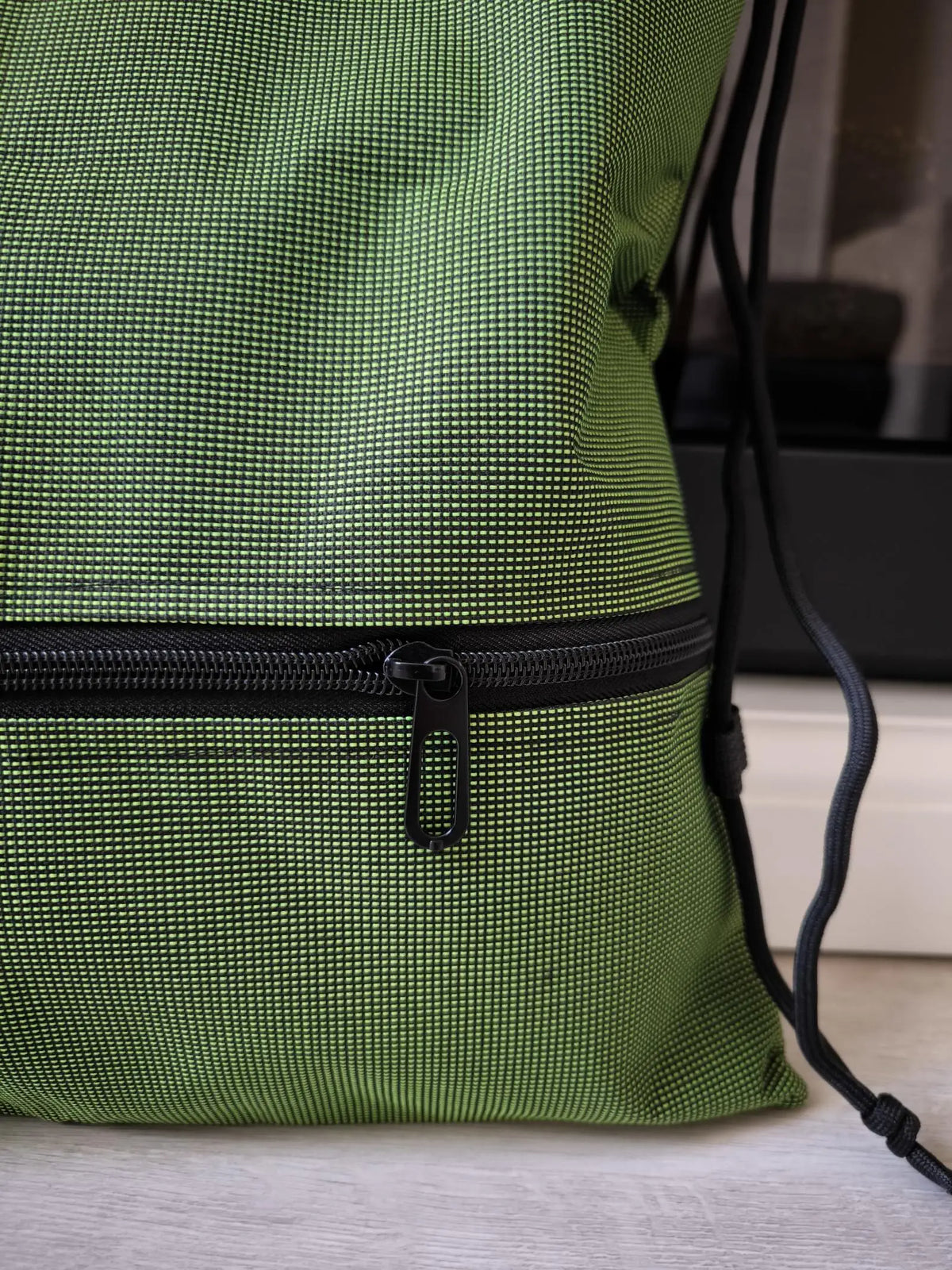 Mochila plegable de tejido Oxford con cordón