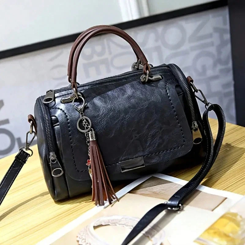 Cartera Boston con borla y correa desmontable