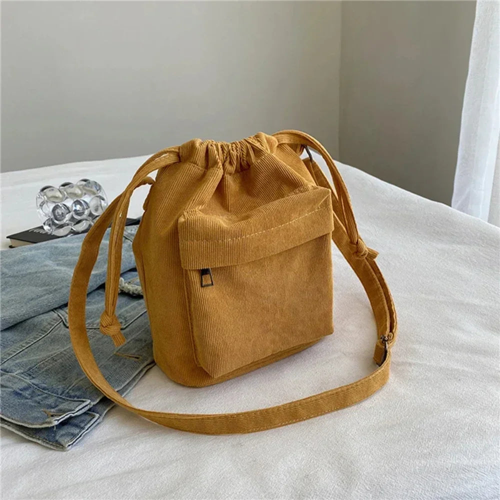 Cartera de corderoy con bolsillo interior con cierre