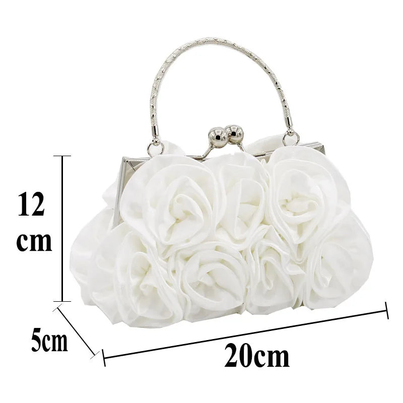 Minaudière rígida con detalle floral y cadena