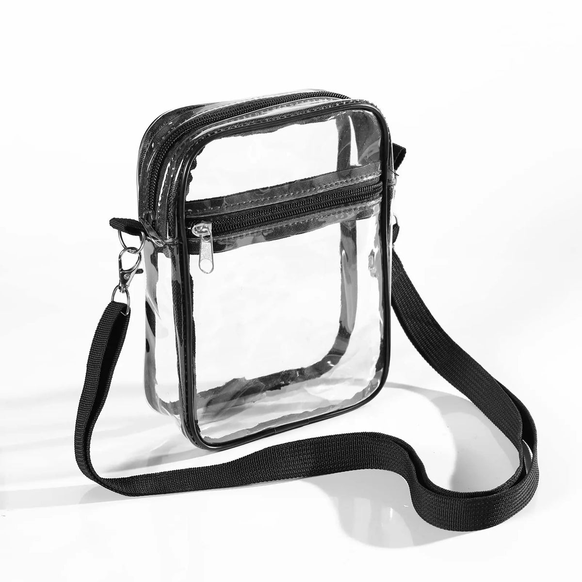 Bandolera transparente de PVC con correa regulable