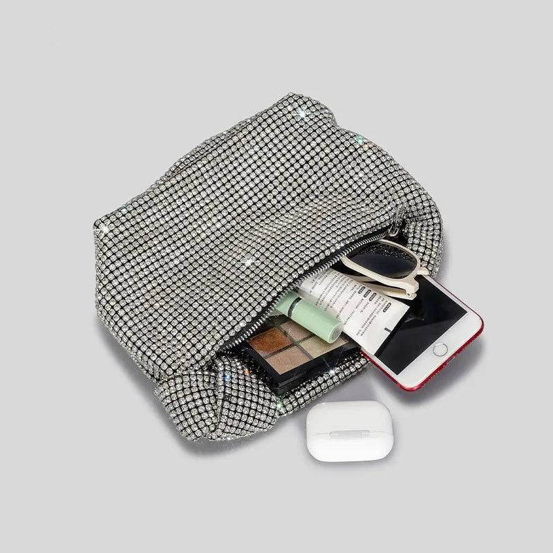 Cartera de fiesta con brillos y asa anudada