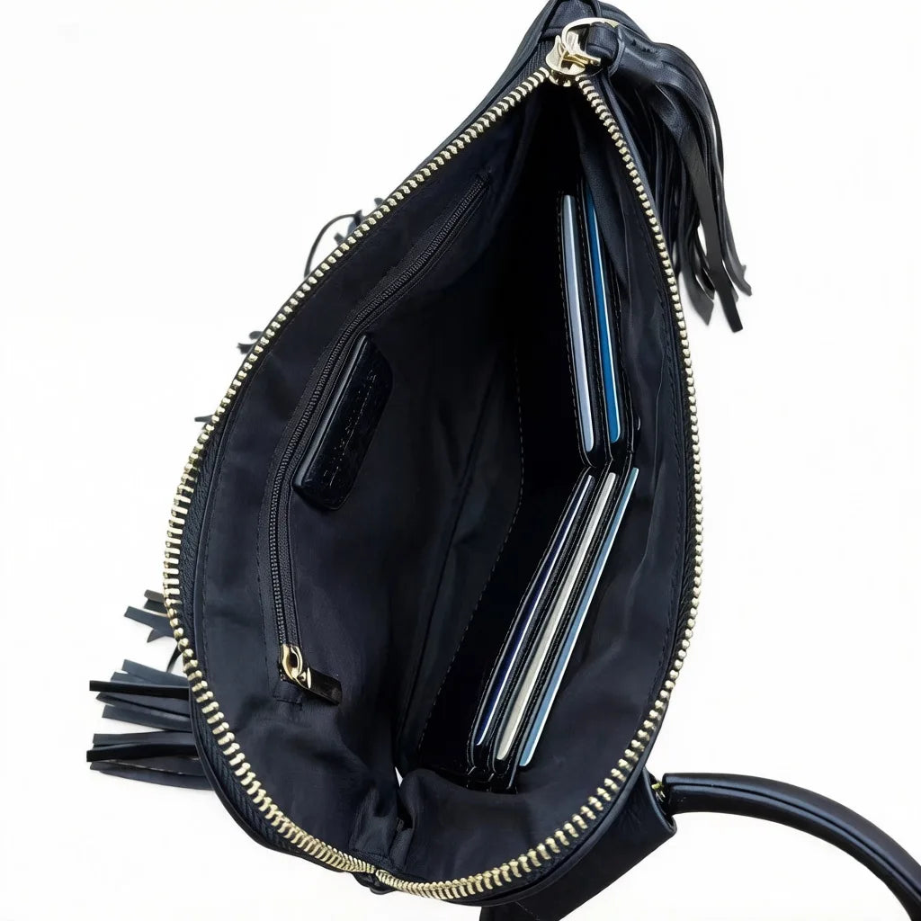 Cartera de mano suave con flecos y cierre