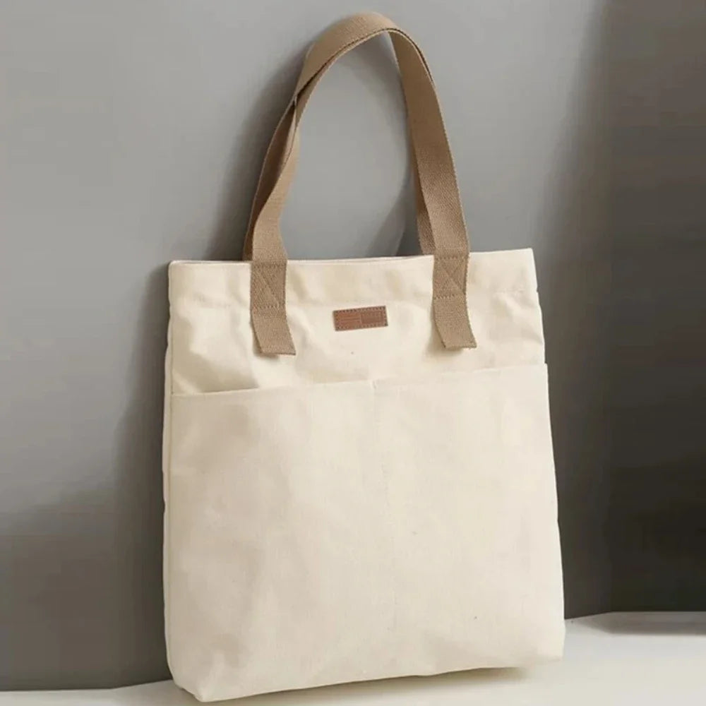 Bolso tote abierto de lona con bolsillo exterior