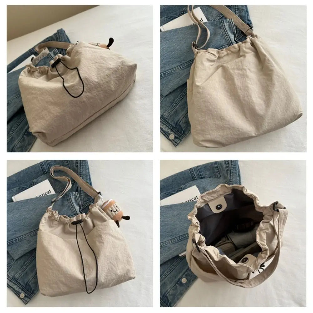 Cartera balde de nylon con cordón y dije opcional