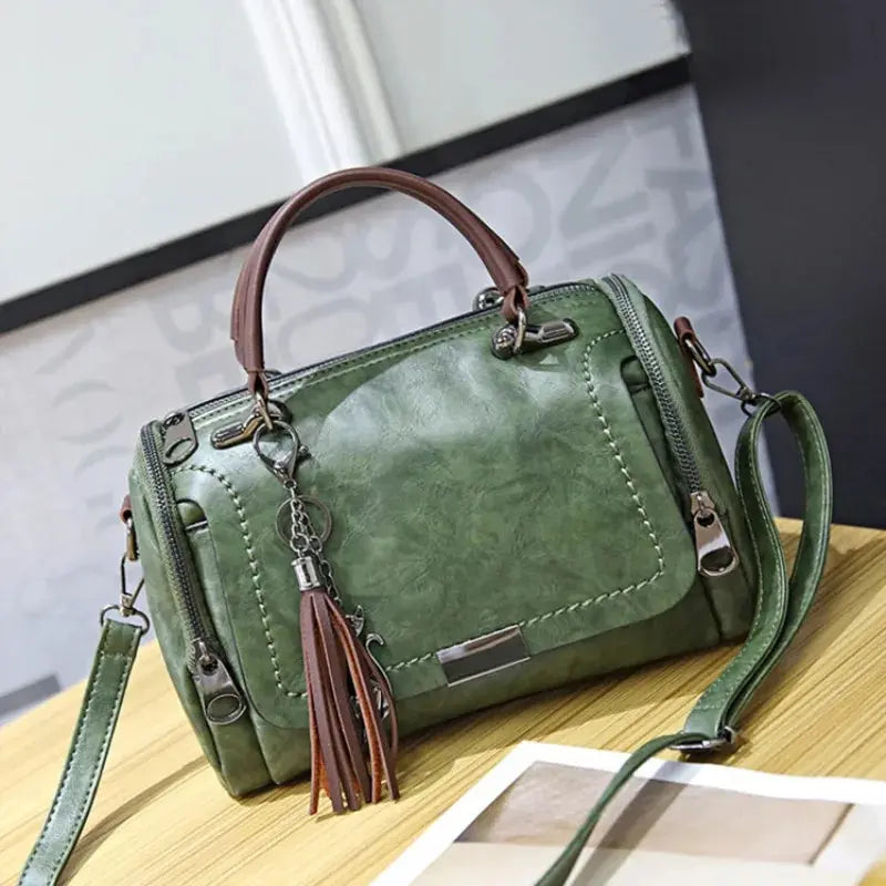 Cartera Boston con borla y correa desmontable