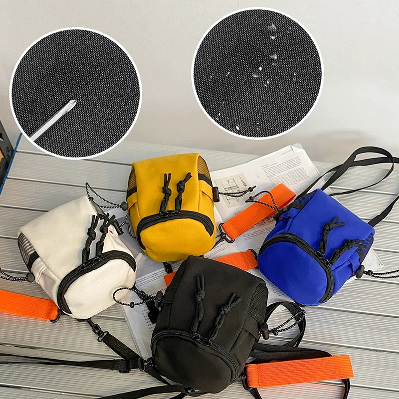 Mini bandolera de nylon con cierre para objetos pequeños