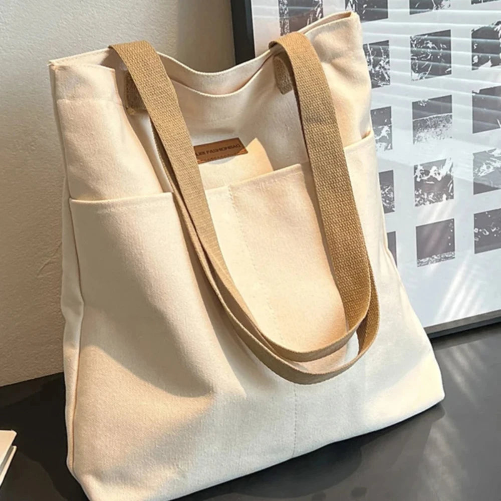 Bolso tote abierto de lona con bolsillo exterior