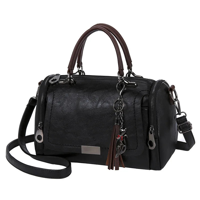 Cartera Boston con borla y correa desmontable