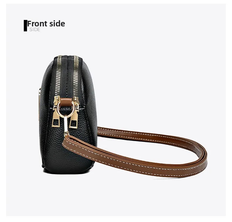 Bandolera negra de cuero con silueta curva