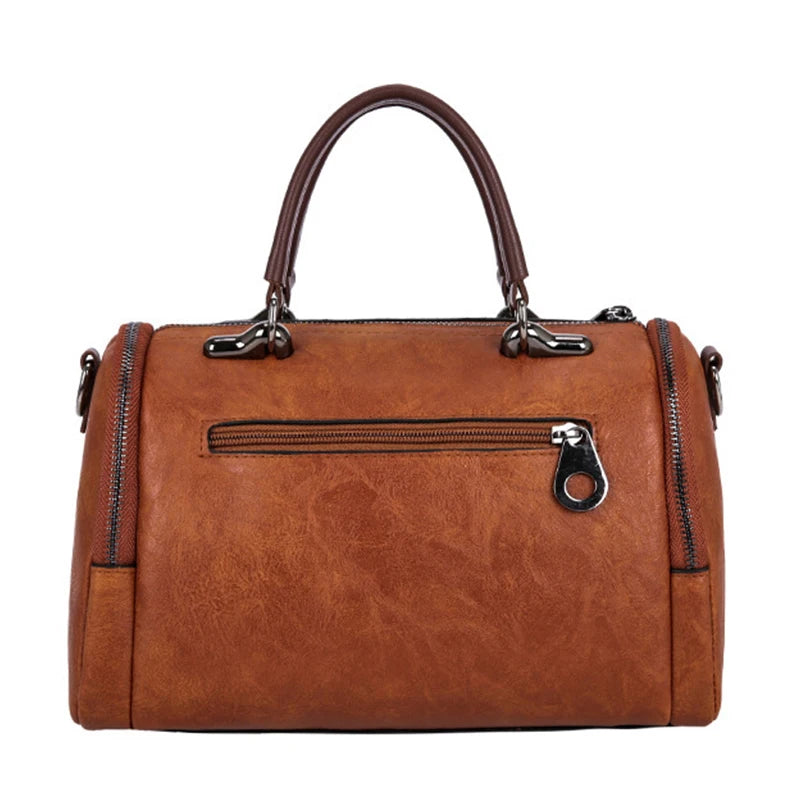 Cartera Boston con borla y correa desmontable