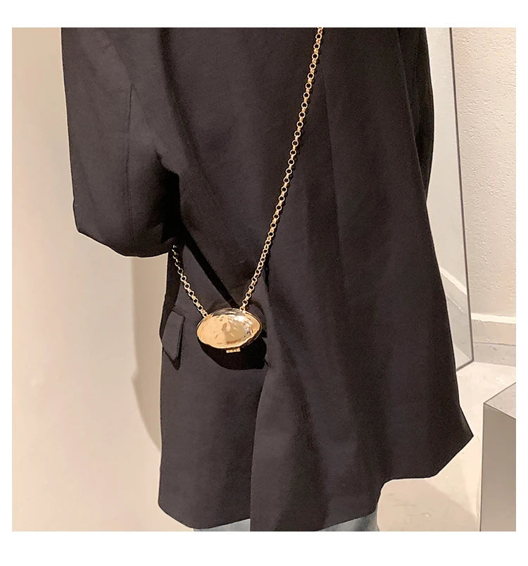 Minaudière metálica mini con cadena cruzada