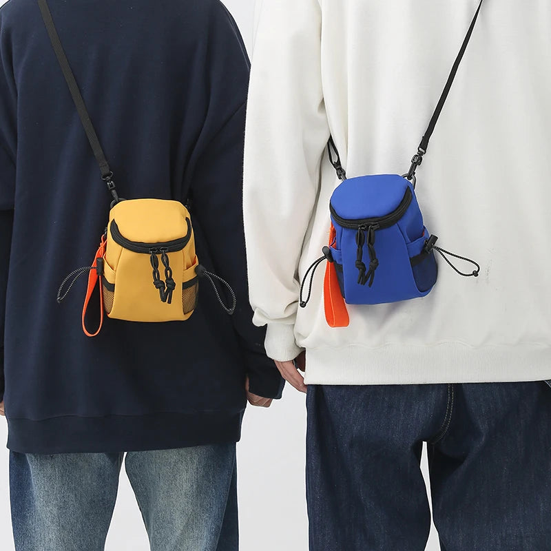 Mini bandolera de nylon con cierre para objetos pequeños