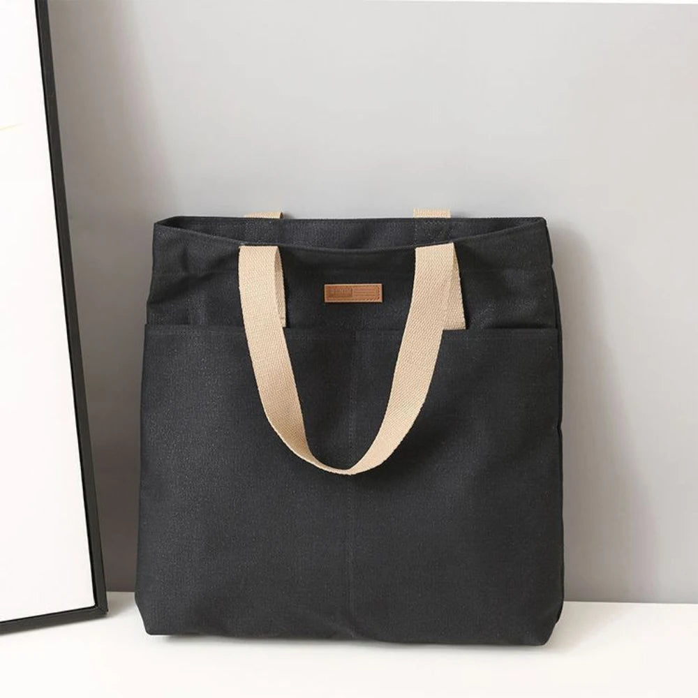 Bolso tote abierto de lona con bolsillo exterior