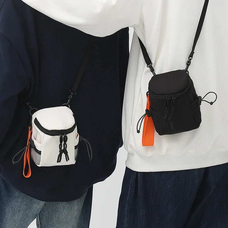 Mini bandolera de nylon con cierre para objetos pequeños